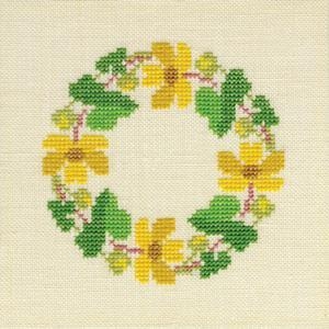 Fremme Stickpackung – Dotterblumenkranz